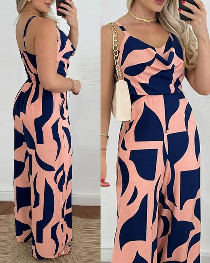 Damer Elegant Jumpsuit med Flödande Tyg och Modernt Blommönster Mirla-Eva Jonsson