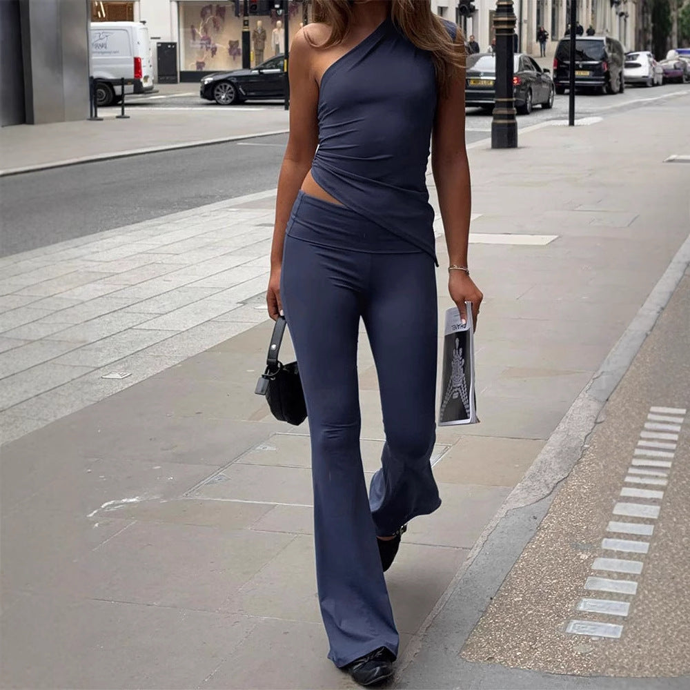 Damer Elegant Jumpsuit med asymmetrisk design och dekorativ midja Mirla-Eva Jonsson