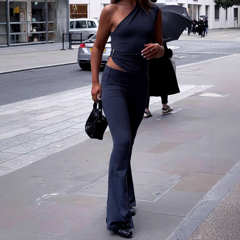 Damer Elegant Jumpsuit med asymmetrisk design och dekorativ midja Mirla-Eva Jonsson