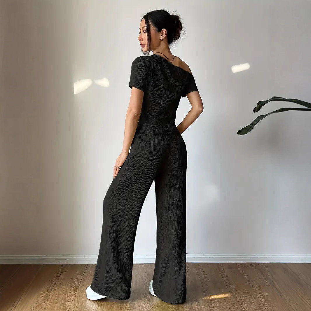 Damer Elegant Jumpsuit med asymmetrisk skärning och rynkor Eva Jonsson-Eva Jonsson