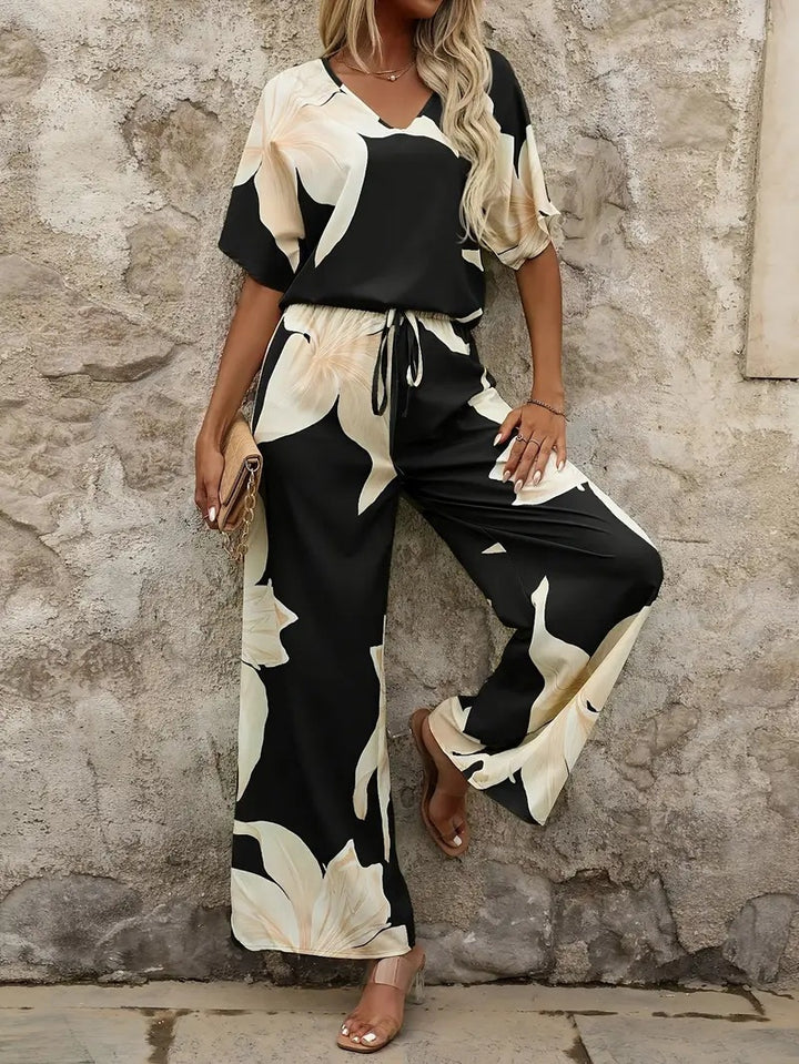 Damer Elegant Jumpsuit med blommönster och vida ben Mirla-Eva Jonsson