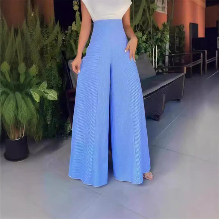 Damer Elegant Jumpsuit med dekorativ sprund och vida ben Mirla-Eva Jonsson