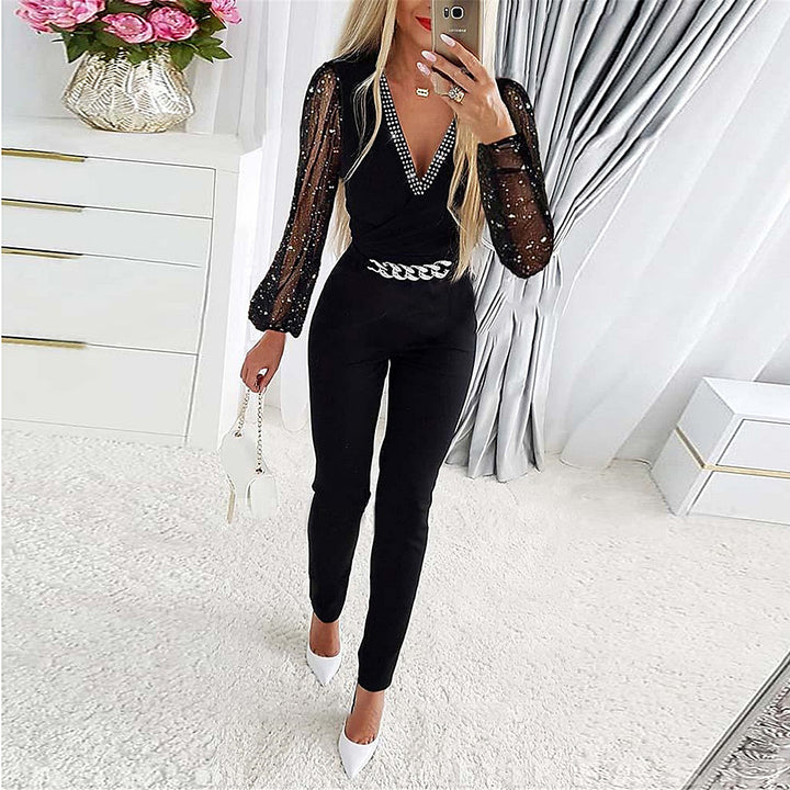 Damer Elegant Jumpsuit med genomskinliga puffärmar och strassdetaljer Mirla-Eva Jonsson
