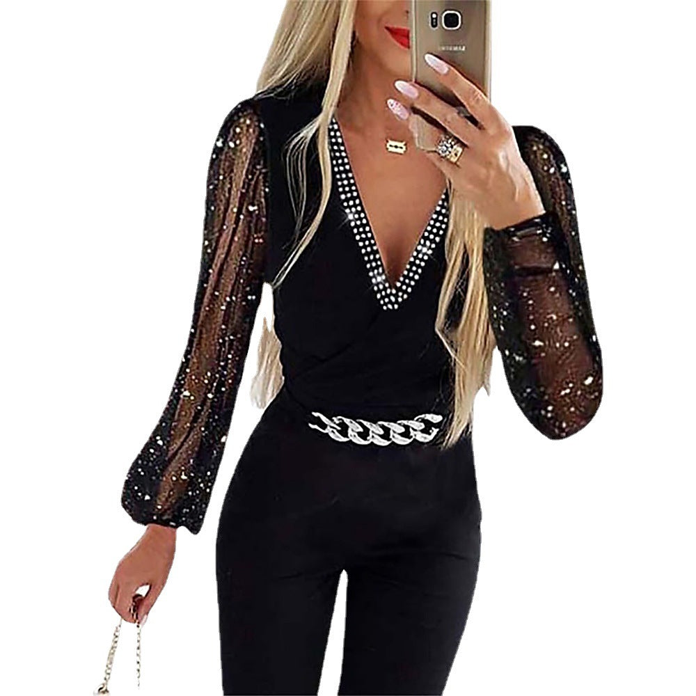 Damer Elegant Jumpsuit med genomskinliga puffärmar och strassdetaljer Mirla-Eva Jonsson