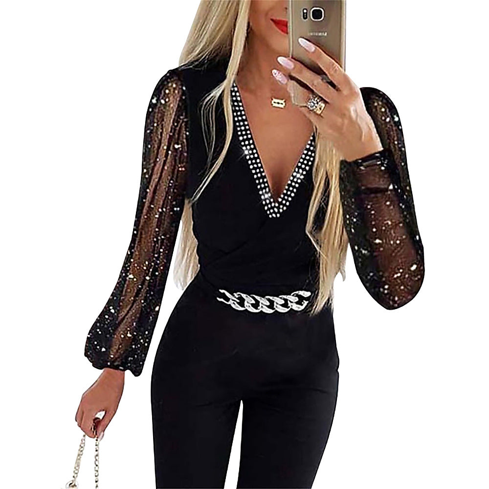Damer Elegant Jumpsuit med genomskinliga puffärmar och strassdetaljer Mirla-Eva Jonsson