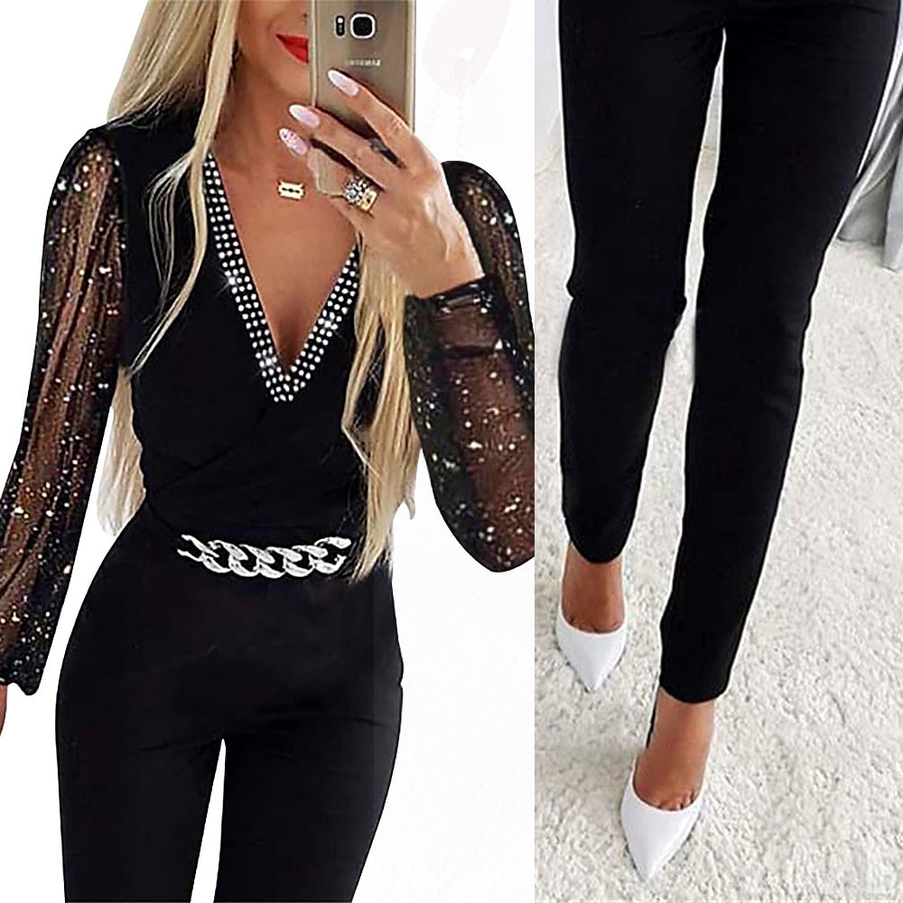 Damer Elegant Jumpsuit med genomskinliga puffärmar och strassdetaljer Mirla-Eva Jonsson