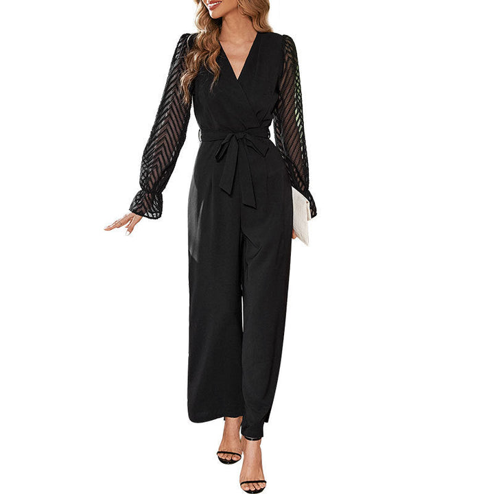 Damer Elegant Jumpsuit med justerbart bälte och transparent ärmdesign Mirla-Eva Jonsson