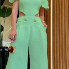 Damer Elegant Jumpsuit med skärddetaljer och mjukt flödande byxben Mirla-Eva Jonsson