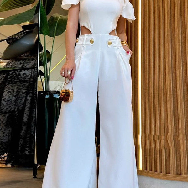 Damer Elegant Jumpsuit med skärddetaljer och mjukt flödande byxben Mirla-Eva Jonsson