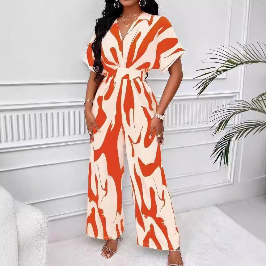Damer Elegant Jumpsuit med stort mönster och V-hals Mirla-Eva Jonsson