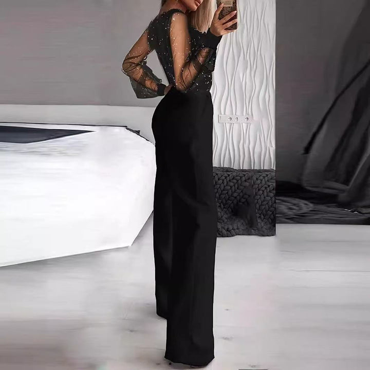 Damer Elegant Jumpsuit med transparenta ärmar och glittrande detaljer Mirla-Eva Jonsson