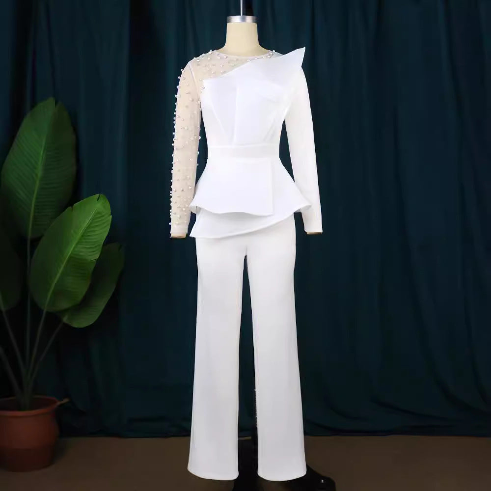 Damer Elegant Jumpsuit med transparenta puffärmar och djup V-ringning Mirla-Eva Jonsson