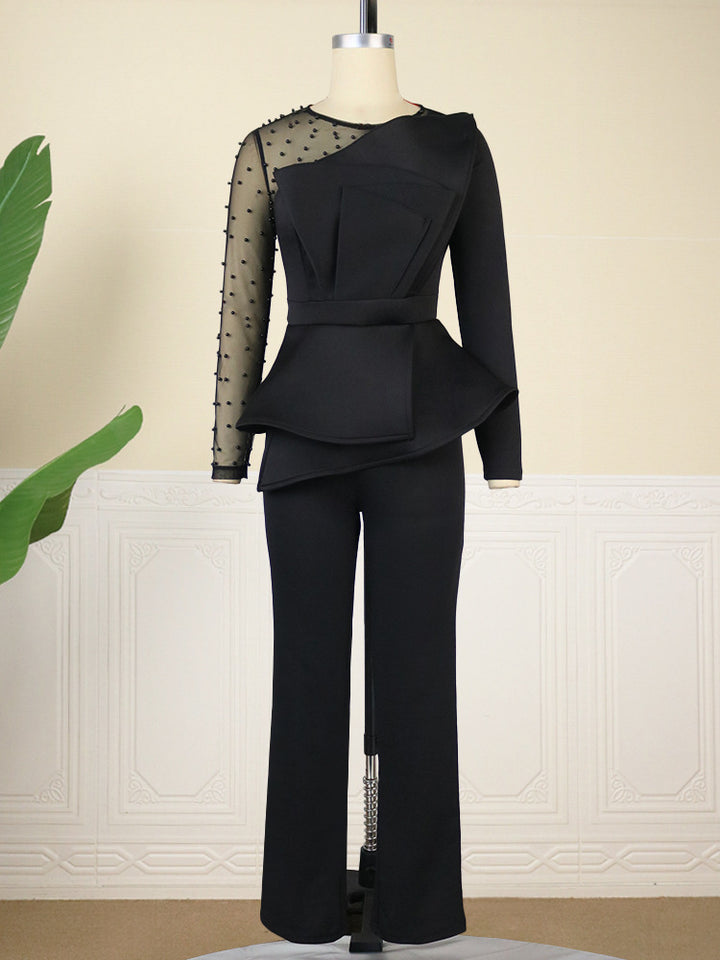 Damer Elegant Jumpsuit med transparenta puffärmar och djup V-ringning Mirla-Eva Jonsson