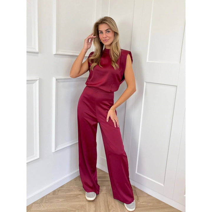Damer Elegant Jumpsuit med vida ben och ärmlös design Mirla-Eva Jonsson