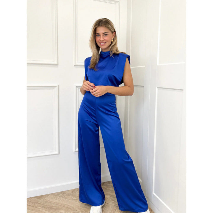 Damer Elegant Jumpsuit med vida ben och ärmlös design Mirla-Eva Jonsson