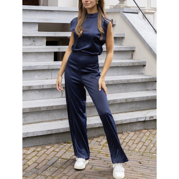 Damer Elegant Jumpsuit med vida ben och ärmlös design Mirla-Eva Jonsson