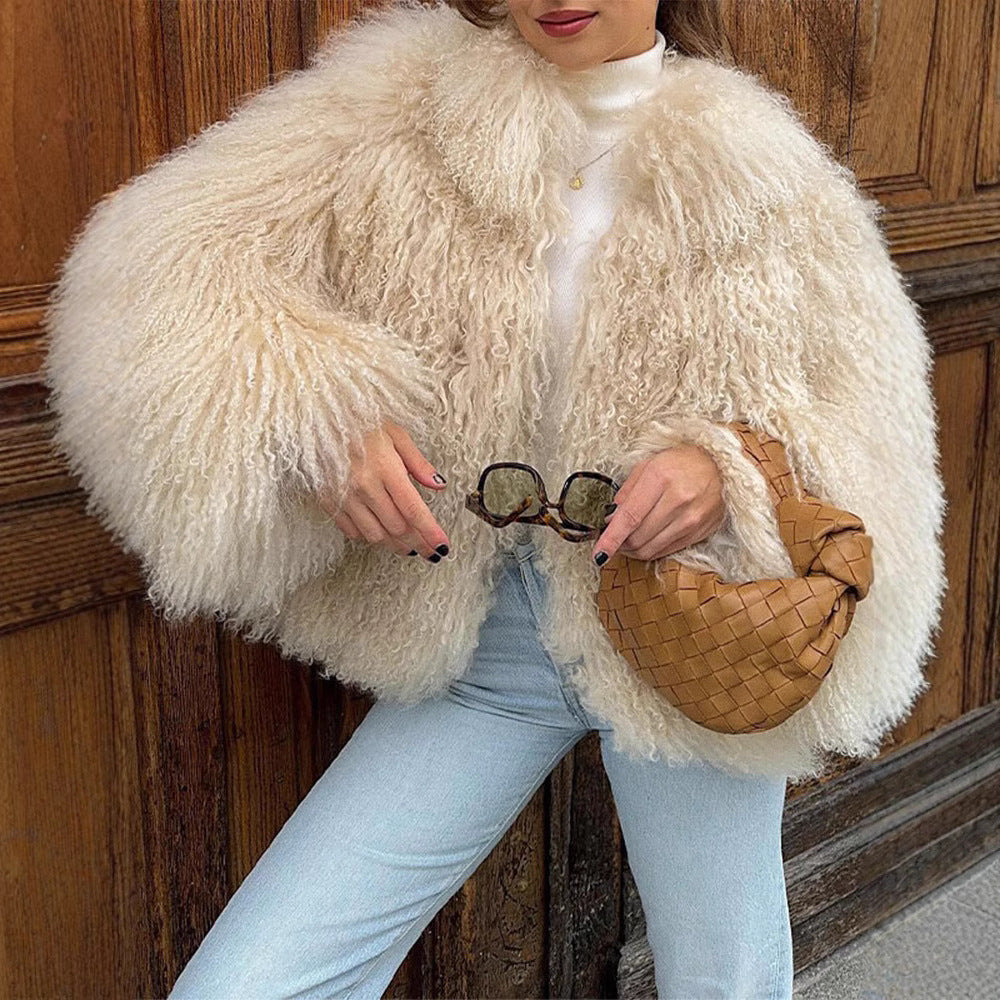 Damer Elegant Konstpälsjacka med hög krage och stilren design Mirla-Eva Jonsson