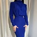 Damer Elegant Långärmad Maxi Klänning med förfinad Drapering och Hög Krage Mirla-Eva Jonsson