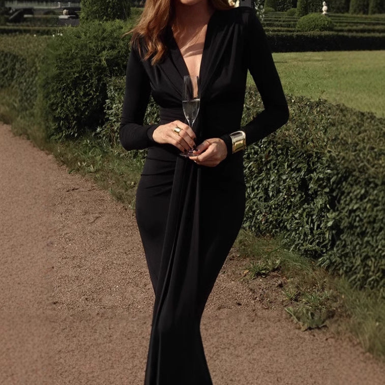 Damer Elegant Långärmad Maxi-Klänning med raffinerad knutdetalj och figursydd design Eva Jonsson-Eva Jonsson