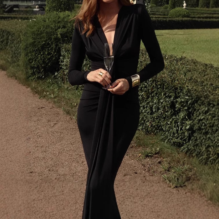 Damer Elegant Långärmad Maxi-Klänning med raffinerad knutdetalj och figursydd design Eva Jonsson-Eva Jonsson