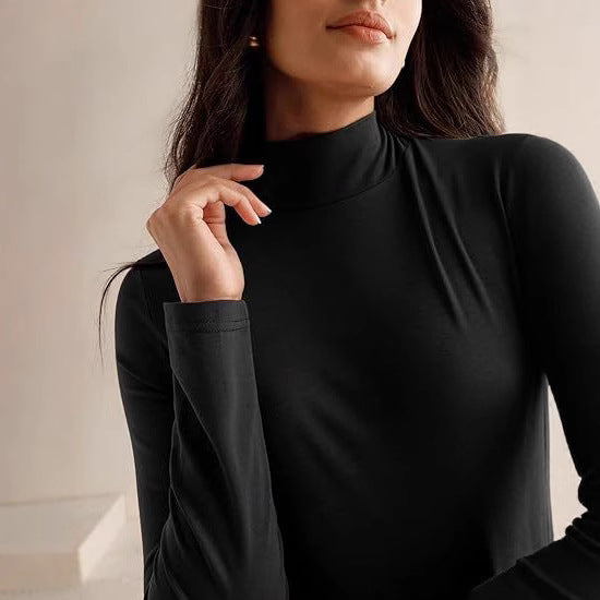 Damer Elegant Långärmad Maxikjol med hög krage och flödande kjol Mirla-Eva Jonsson