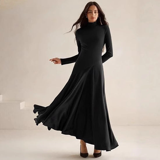 Damer Elegant Långärmad Maxikjol med hög krage och flödande kjol Mirla-Eva Jonsson