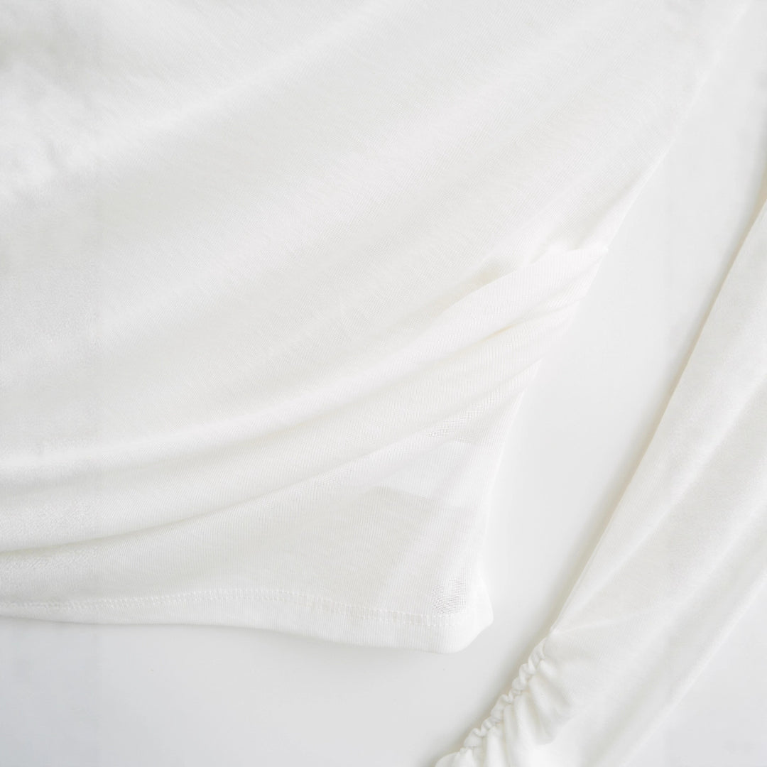 Damer Elegant Långärmad Topp med moderiktig Draperi och asymmetrisk Skärning Mirla-Eva Jonsson