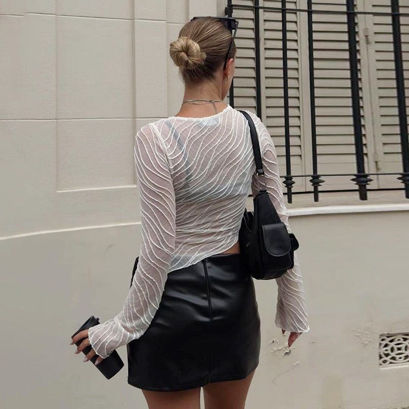 Damer Elegant Långärmad Transparenttopp med strukturerad Design Mirla-Eva Jonsson