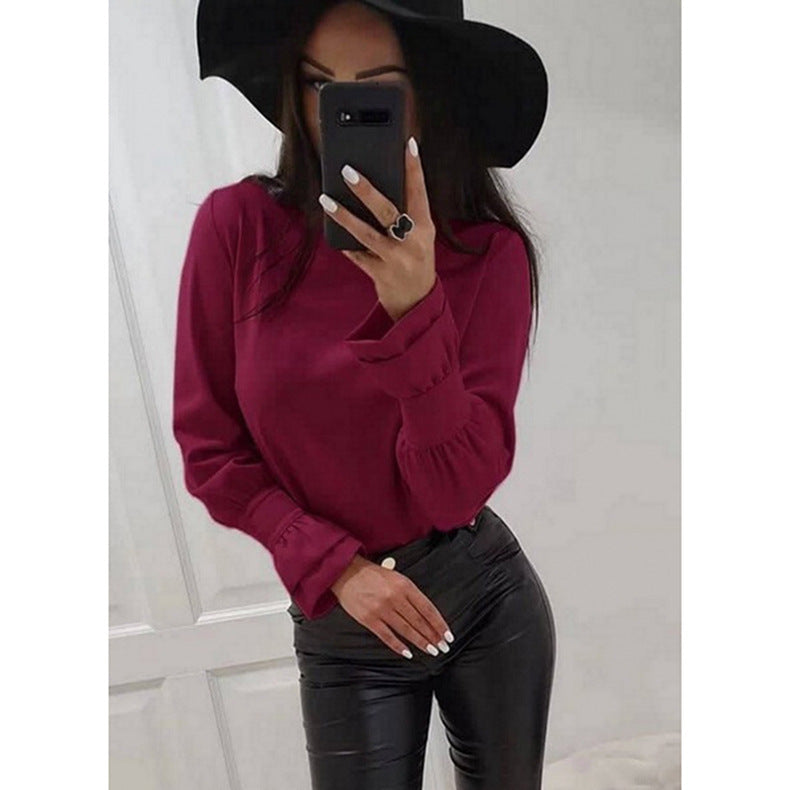 Damer Elegant Långärmad topp med moderiktiga puffärmar och fint materialmix Mirla-Eva Jonsson