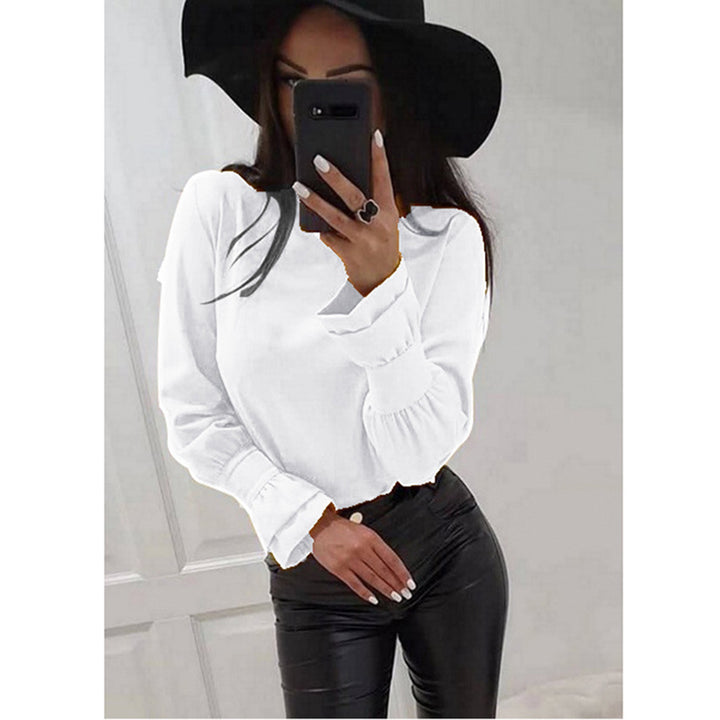 Damer Elegant Långärmad topp med moderiktiga puffärmar och fint materialmix Mirla-Eva Jonsson