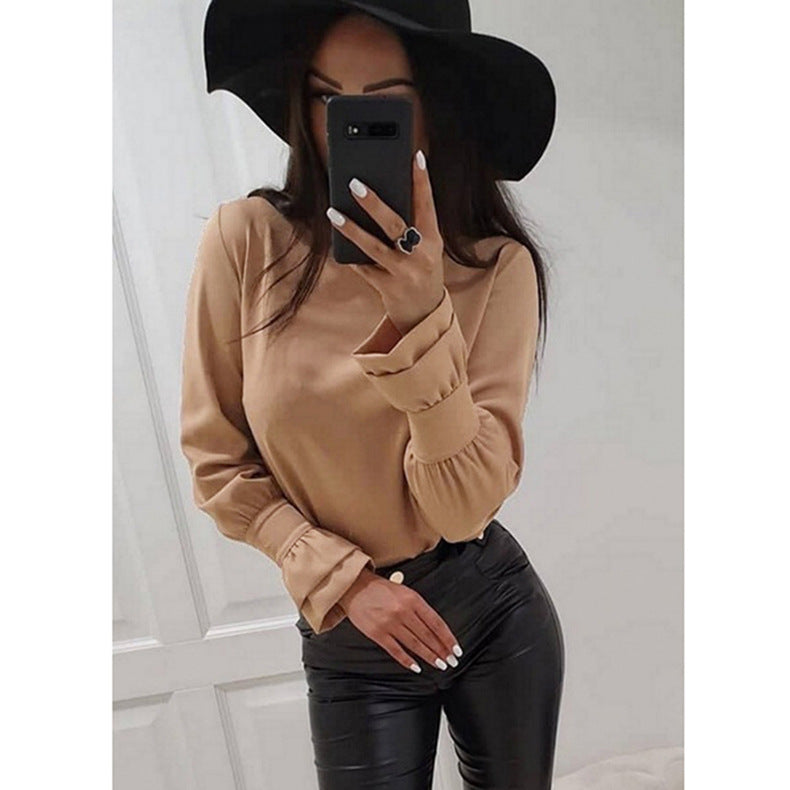 Damer Elegant Långärmad topp med moderiktiga puffärmar och fint materialmix Mirla-Eva Jonsson