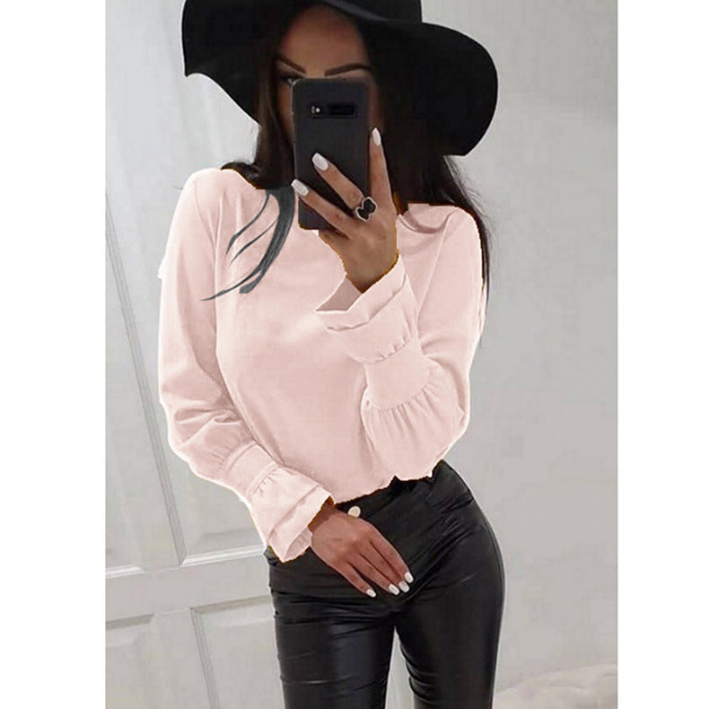 Damer Elegant Långärmad topp med moderiktiga puffärmar och fint materialmix Mirla-Eva Jonsson