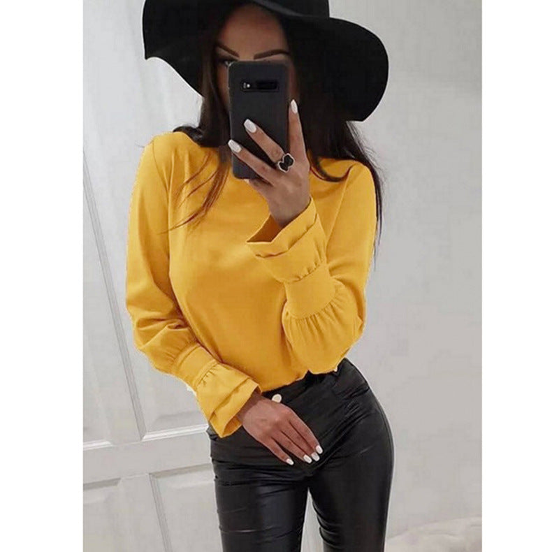 Damer Elegant Långärmad topp med moderiktiga puffärmar och fint materialmix Mirla-Eva Jonsson