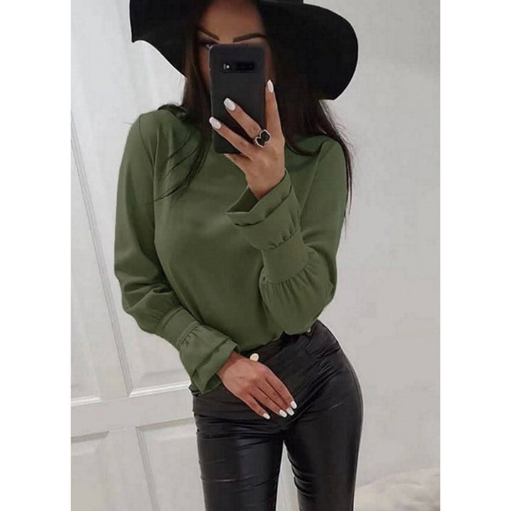 Damer Elegant Långärmad topp med moderiktiga puffärmar och fint materialmix Mirla-Eva Jonsson