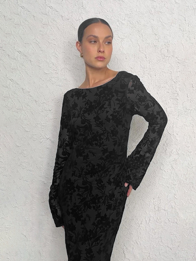 Damer Elegant Maxi Klänning med Blommig Texturerad Design och Långa Ärmar Mirla-Eva Jonsson