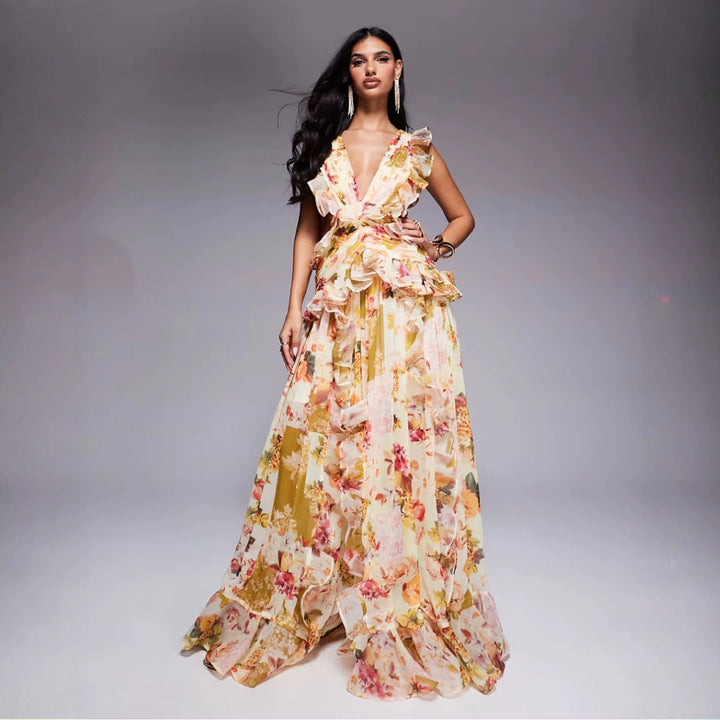 Damer Elegant Maxi Klänning med Blommiga Volanger och Djup V-Hals-Eva Jonsson