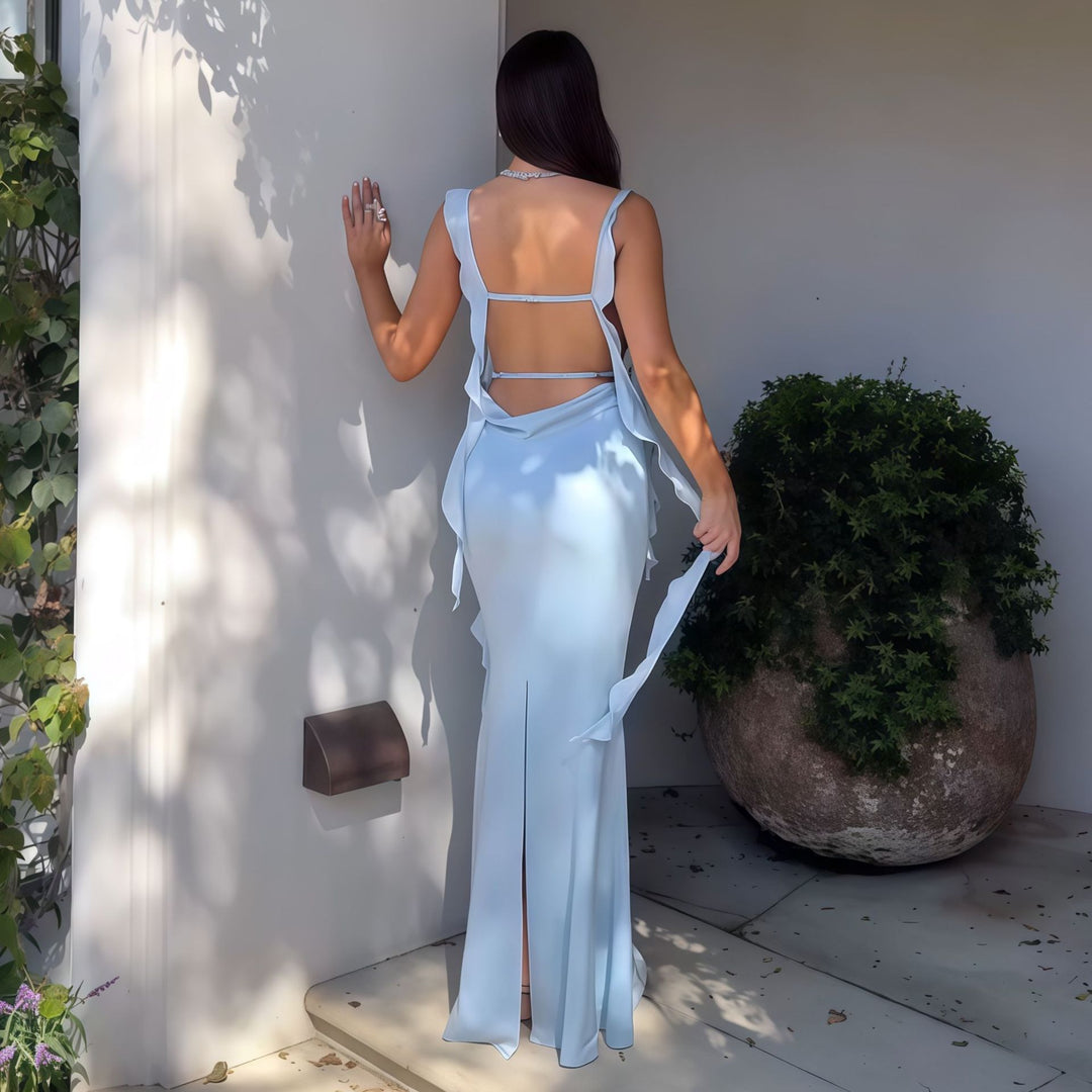 Damer Elegant Maxi-Klänning med asymmetriska volangdetaljer och djup V-ringning Mirla-Eva Jonsson