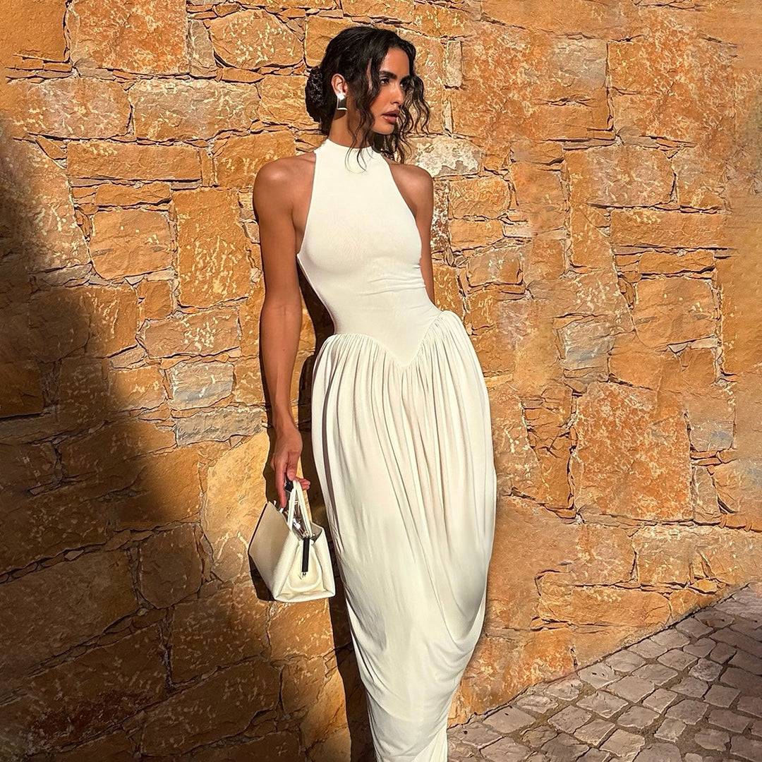 Damer Elegant Maxi- jumpsuit med hög krage och flödande fåll Mirla-Eva Jonsson