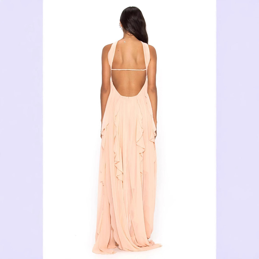 Damer Elegant Maxi-klänning med asymmetrisk fåll och delikata volangdetaljer Mirla-Eva Jonsson