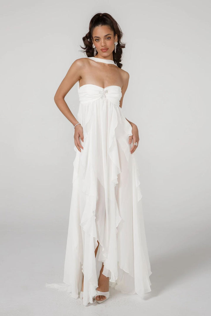 Damer Elegant Maxi-klänning med asymmetrisk fåll och delikata volangdetaljer Mirla-Eva Jonsson