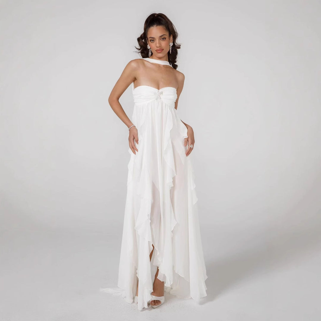 Damer Elegant Maxi-klänning med asymmetrisk fåll och delikata volangdetaljer Mirla-Eva Jonsson