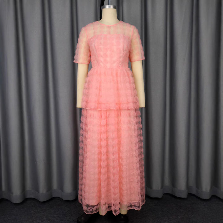 Damer Elegant Maxi-klänning med blommig volangdesign Mirla-Eva Jonsson