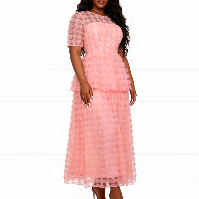 Damer Elegant Maxi-klänning med blommig volangdesign Mirla-Eva Jonsson