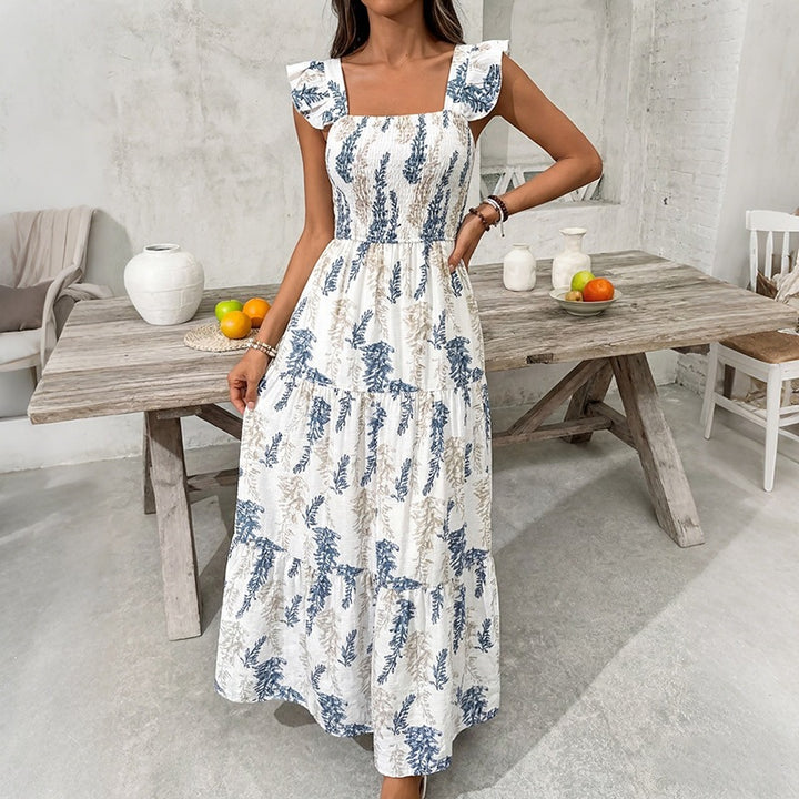Damer Elegant Maxi-klänning med blommigt tryck och off-shoulder volangärm Mirla-Eva Jonsson