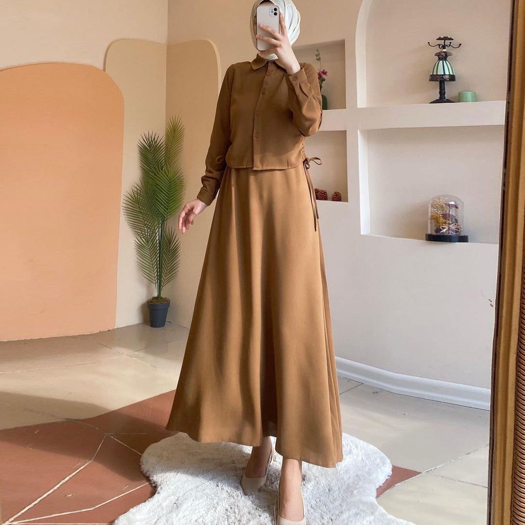 Damer Elegant Maxi-klänning med lång ärm och figursydd design Mirla-Eva Jonsson