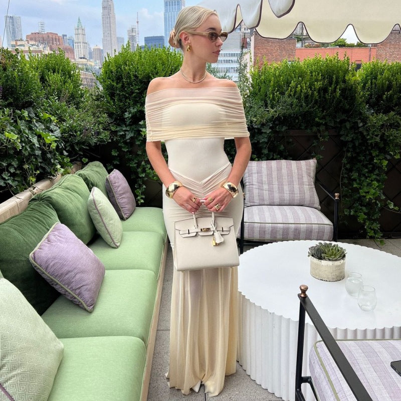 Damer Elegant Maxi-klänning med off-shoulder design och rynkor Mirla-Eva Jonsson