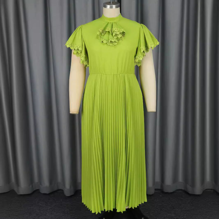 Damer Elegant Maxi-klänning med plisséveck och volangdetaljer Mirla-Eva Jonsson