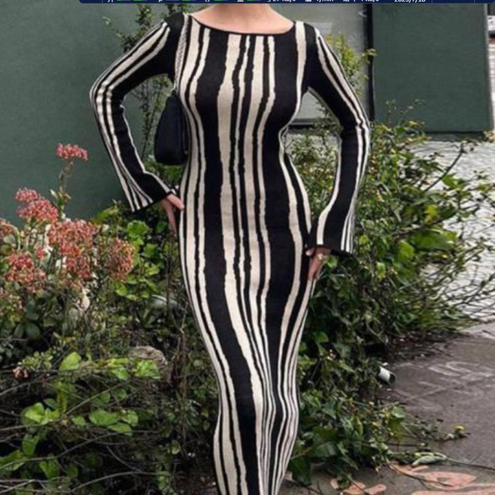 Damer Elegant Maxi-klänning med spännande mönster och långa ärmar Mirla-Eva Jonsson