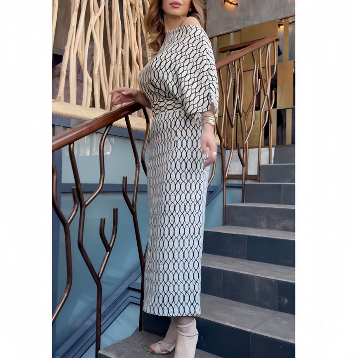Damer Elegant Maxikjol med asymmetrisk skärning och strukturerat mönster Mirla-Eva Jonsson