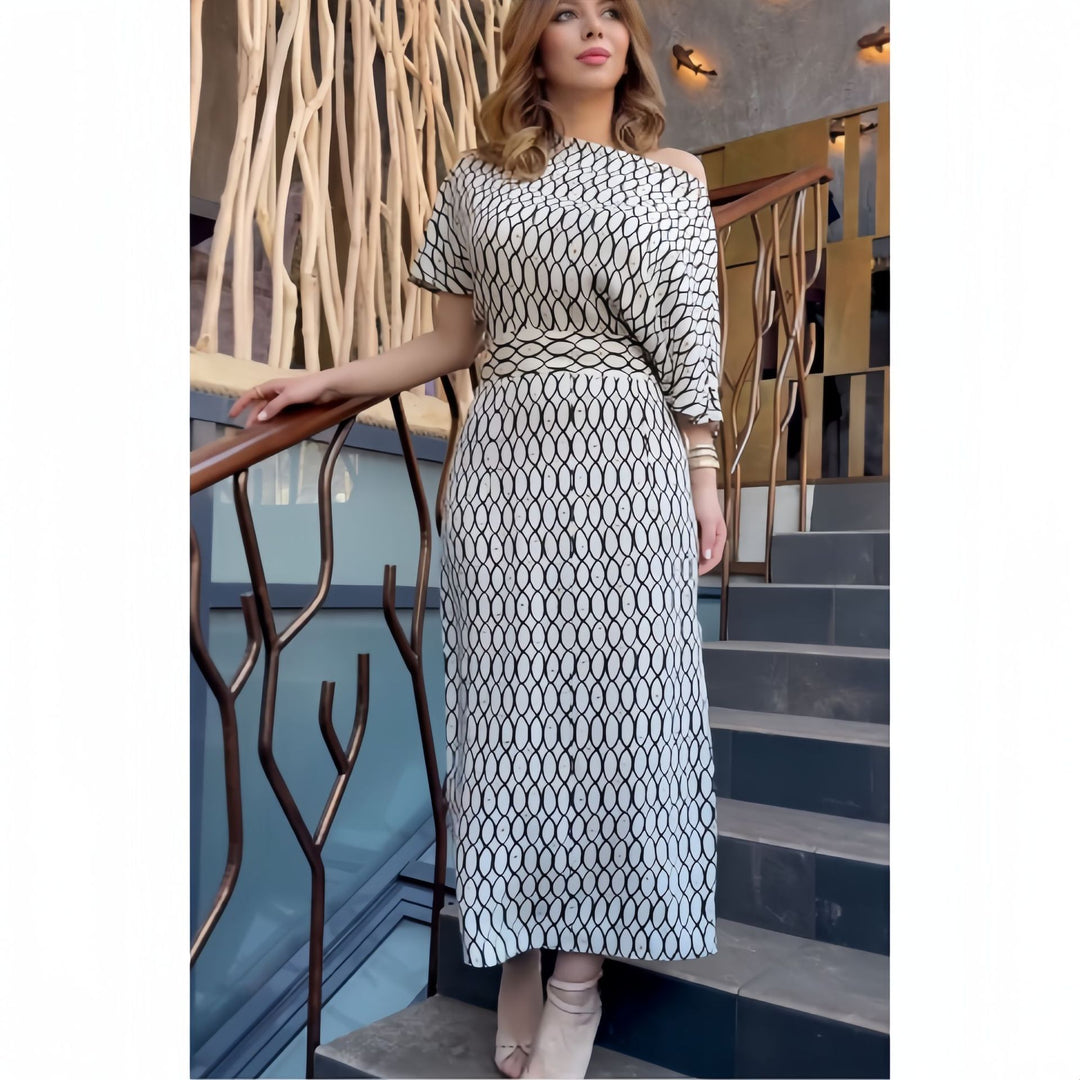 Damer Elegant Maxikjol med asymmetrisk skärning och strukturerat mönster Mirla-Eva Jonsson